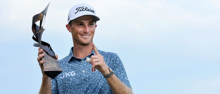 MEMPHIS, TENNESSEE - AUGUST 14: Will Zalatoris of the United States poses with the trophy after putting in to win on the third playoff hole on the 11th green during the final round of the FedEx St. Jude Championship at TPC Southwind on August 14, 2022 in Memphis, Tennessee. (Photo by Andy Lyons/Getty Images)
